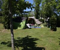 Sunny pitch at les Genêts campsite in the Morbihan