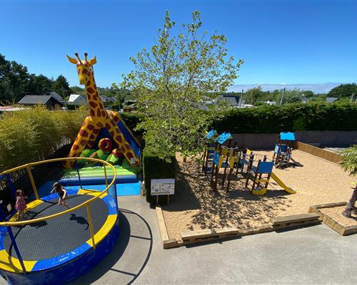 Play area with slide, trampoline, inflatable structure in Brittany